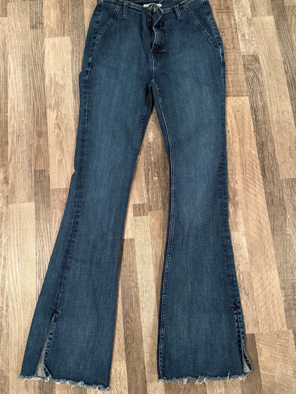 We The Free Dark Blue Flare Jeans with Raw Hem